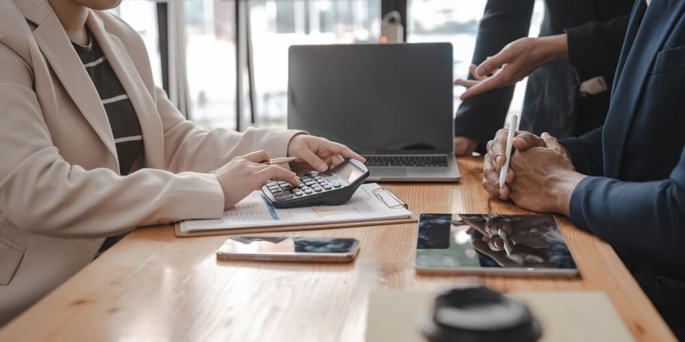 Accountant using calculator